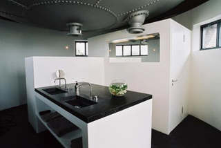 Illustration for article titled Water Tower Apartment Looks Great Inside, Misses Fiery Magical Eye on Top
